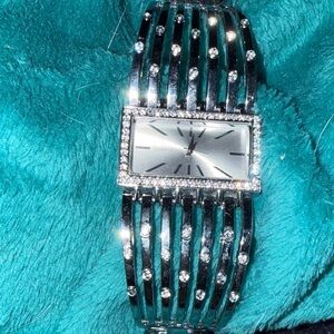 Glamorous Silver Women's Bracelet Watch with Crystal Detailing